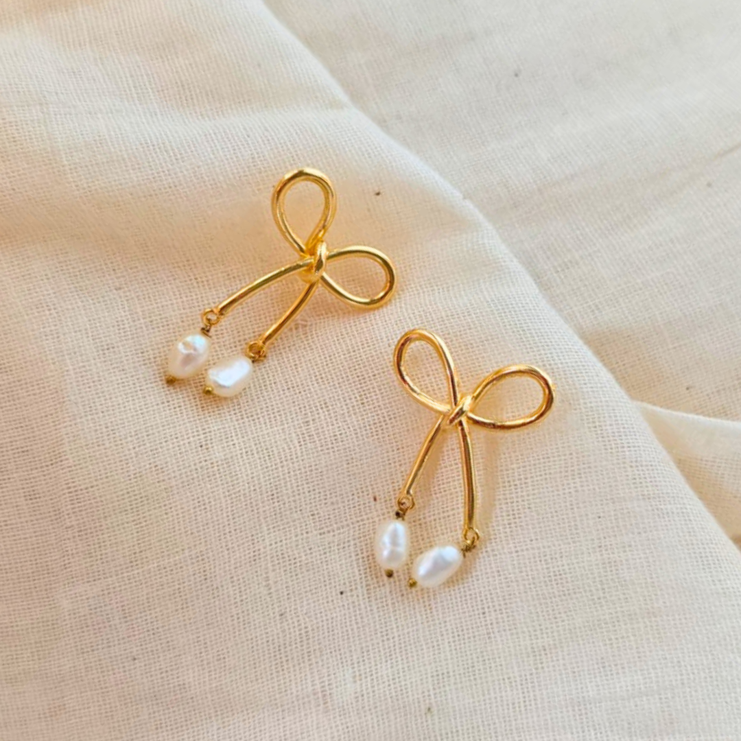 18K rhodium gold-plated bow earrings with dangling twin baroque pearls