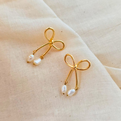 18K rhodium gold-plated bow earrings with dangling twin baroque pearls