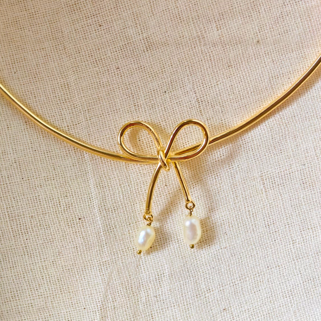18K rhodium gold-plated brass bow necklace with baroque pearl drops