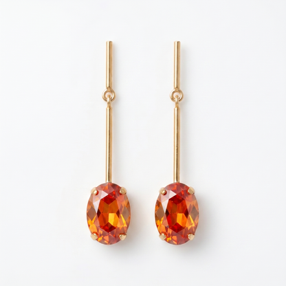 Orange oval CZ stone gold bar drop earrings front view on white background – KANSYA
