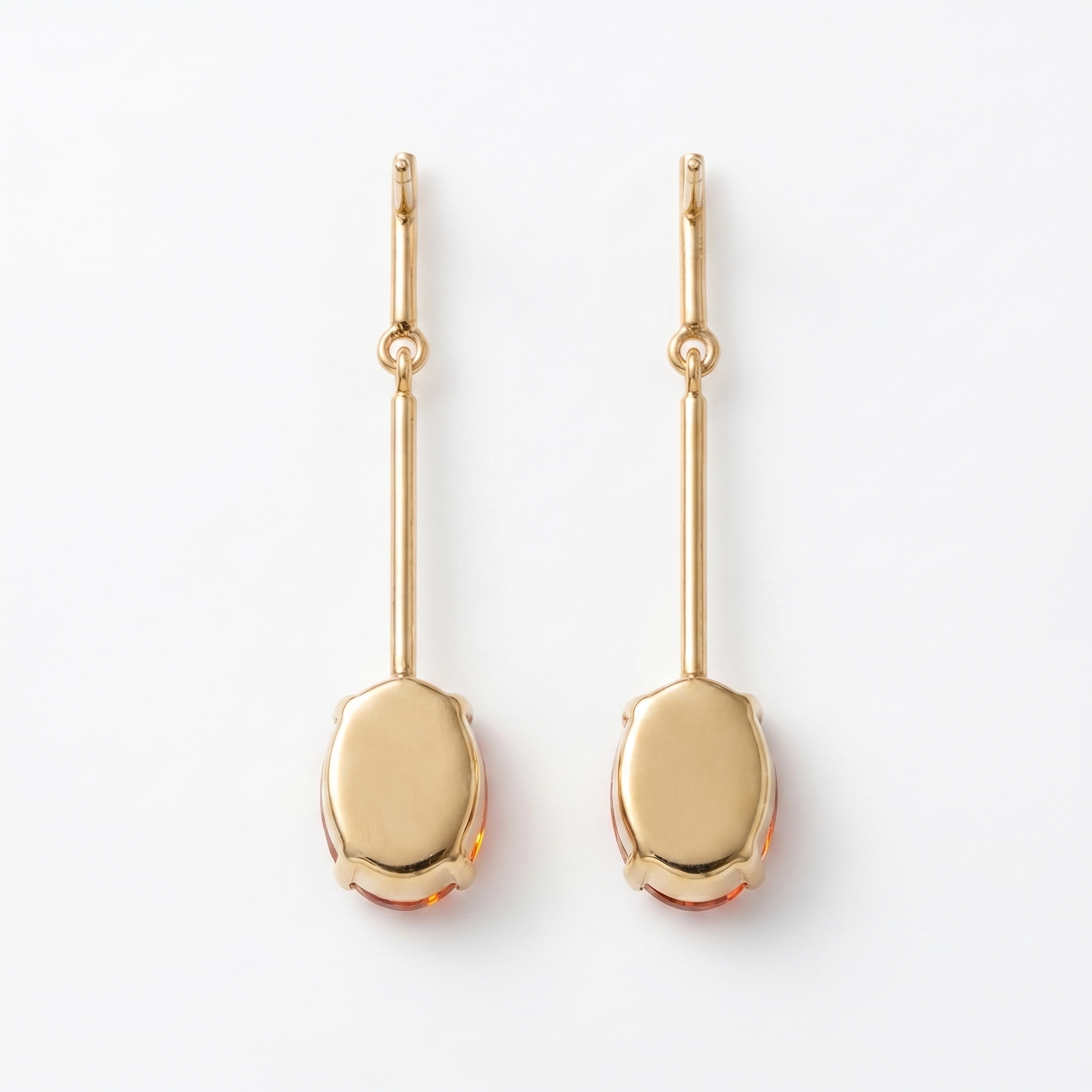 Back view of orange oval CZ gold bar drop earrings showing polished closed gold setting – KANSYA