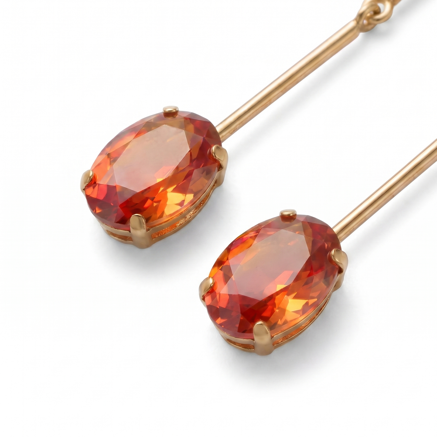 Angled detail view of orange CZ stone gold drop earrings showing faceted sparkle and prong setting – KANSYA