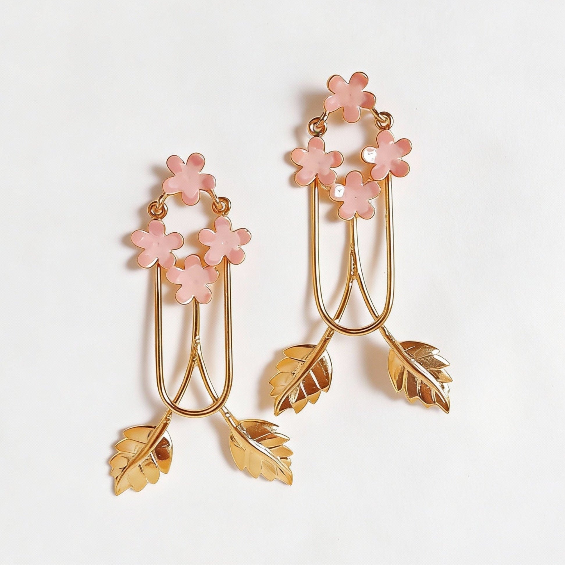 Pair of floral earrings with pink enamel flowers and gold leaves 