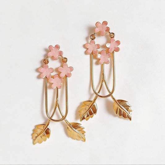 Pair of floral earrings with pink enamel flowers and gold leaves 