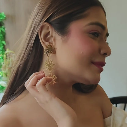 Brass gold-plated Trio Blossom Earrings featuring three cascading floral designs