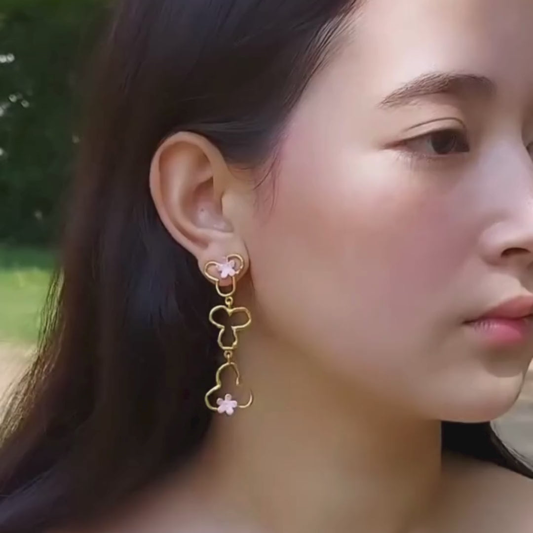 Brass Pink Blossom Trio earrings with pink enamel flowers and 18K rhodium gold plating
