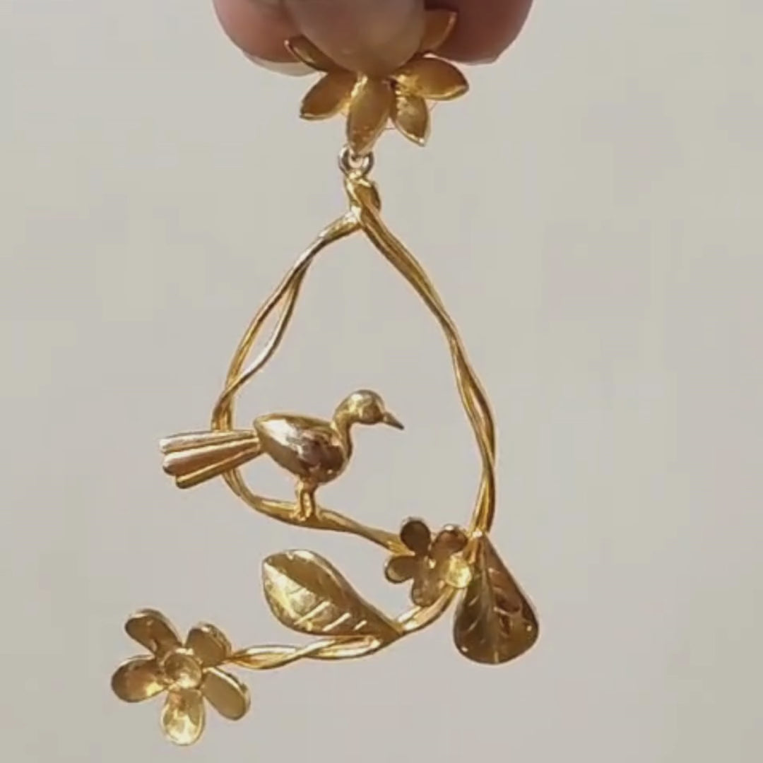 Resting Bird earrings with floral branches and perched bird, crafted in brass with 18K rhodium gold plating
