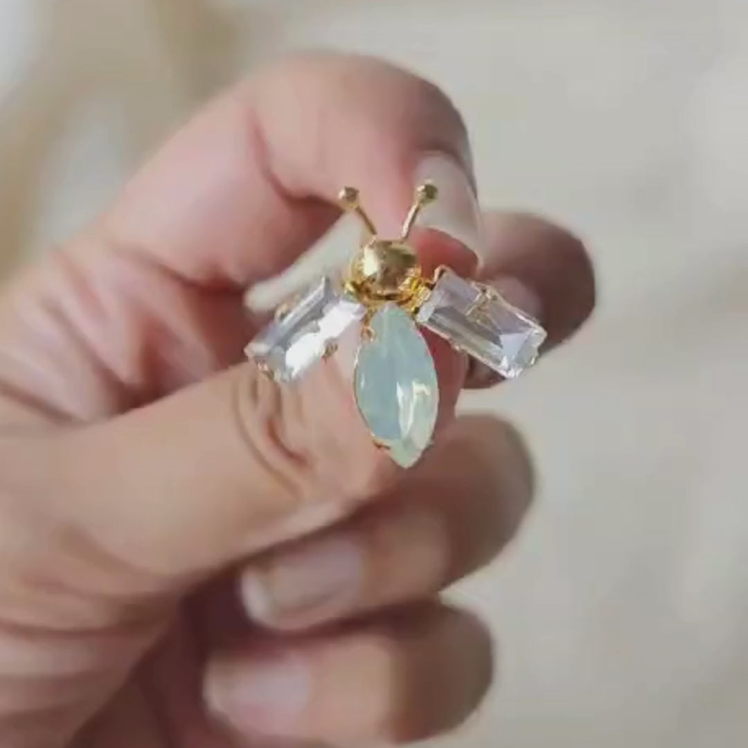 White and opal gold bug ear studs with brass, faux opal navette center and 18K rhodium gold finish