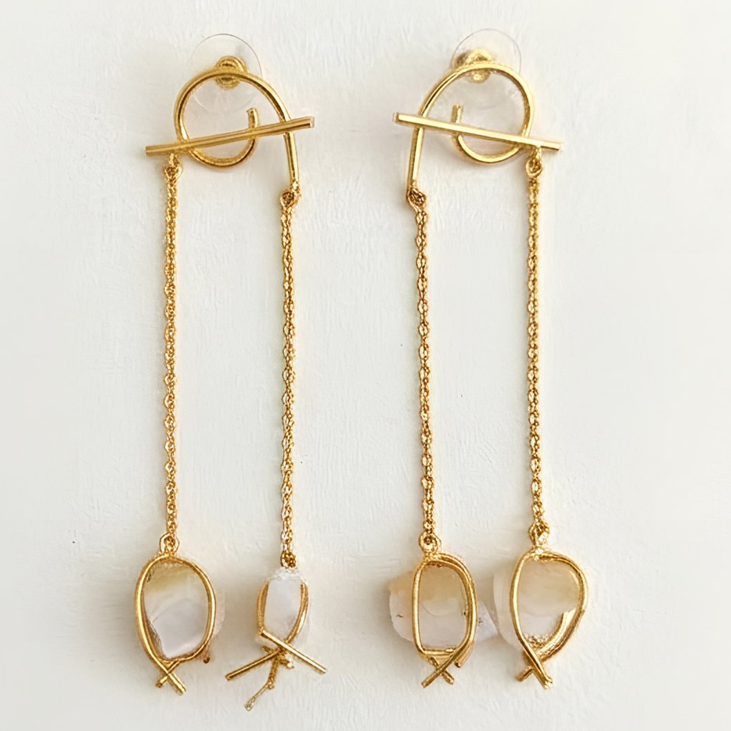Front view of handmade semi-precious white druzy stone dangler earrings in a contemporary gold finish